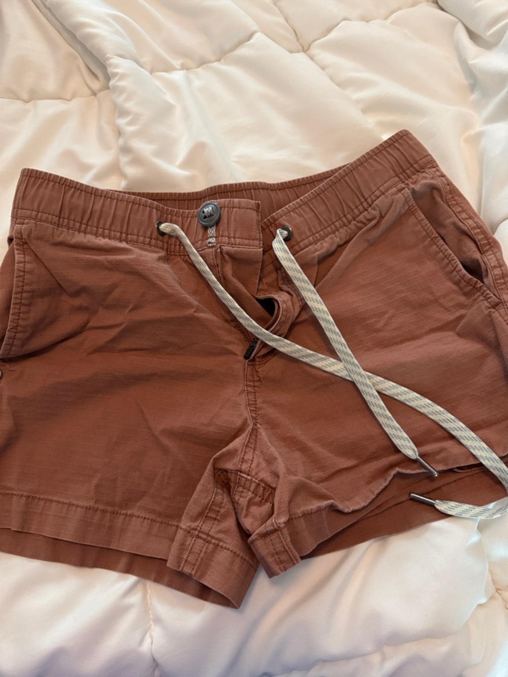 Vuori High-Waist Drawstring Shorts in Rust Brown